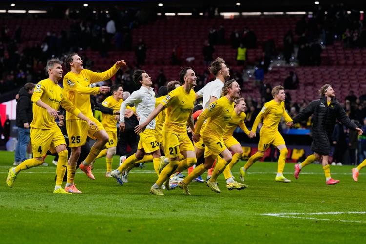 Bodo/Glimt squad runs together in wild celebration after scoring a decisive goal to seal the Inter Milan shock defeat.
