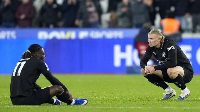 Man City title hopes fade as Erling Haaland looks dejected after dropping points against West Ham.